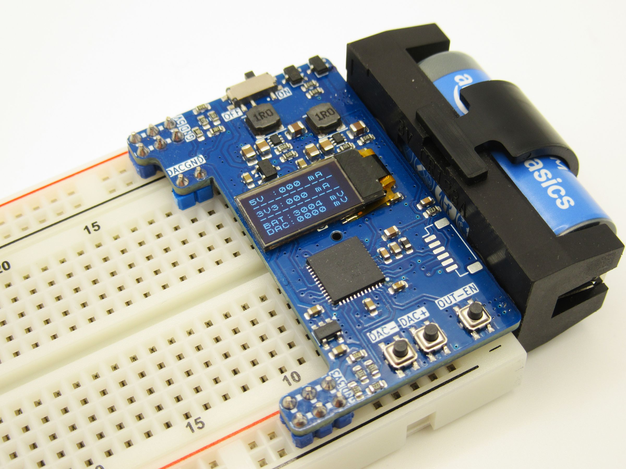 TM8 Lab battery-powered breadboard power supply with OLED display